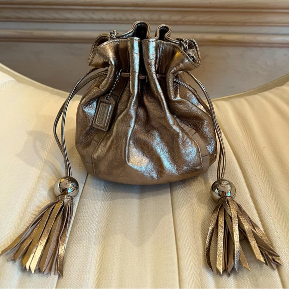 Coach Handbags - Coach Amanda Gold Metallic Leather Tassel Drawstring Shoulder Bag